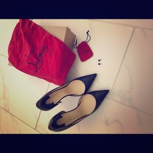 Christian Louboutin stilettos.